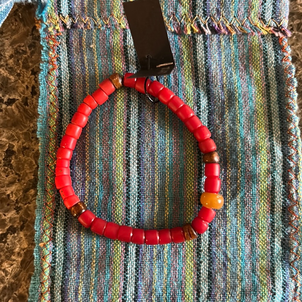 Hand-made semi-precious gemstone bracelet. Coral.